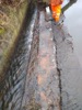 Image 7 of 13 : The brickwork of the overflow can now be seen again and the water in the canal is back to a safe level